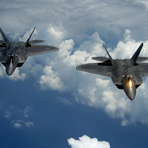 U.S. fighter jets in flight, showcasing the power and precision of modern military aviation.