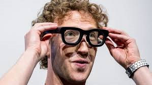 Mark Zuckerberge wearing oversized black glasses, adjusting them with both hands